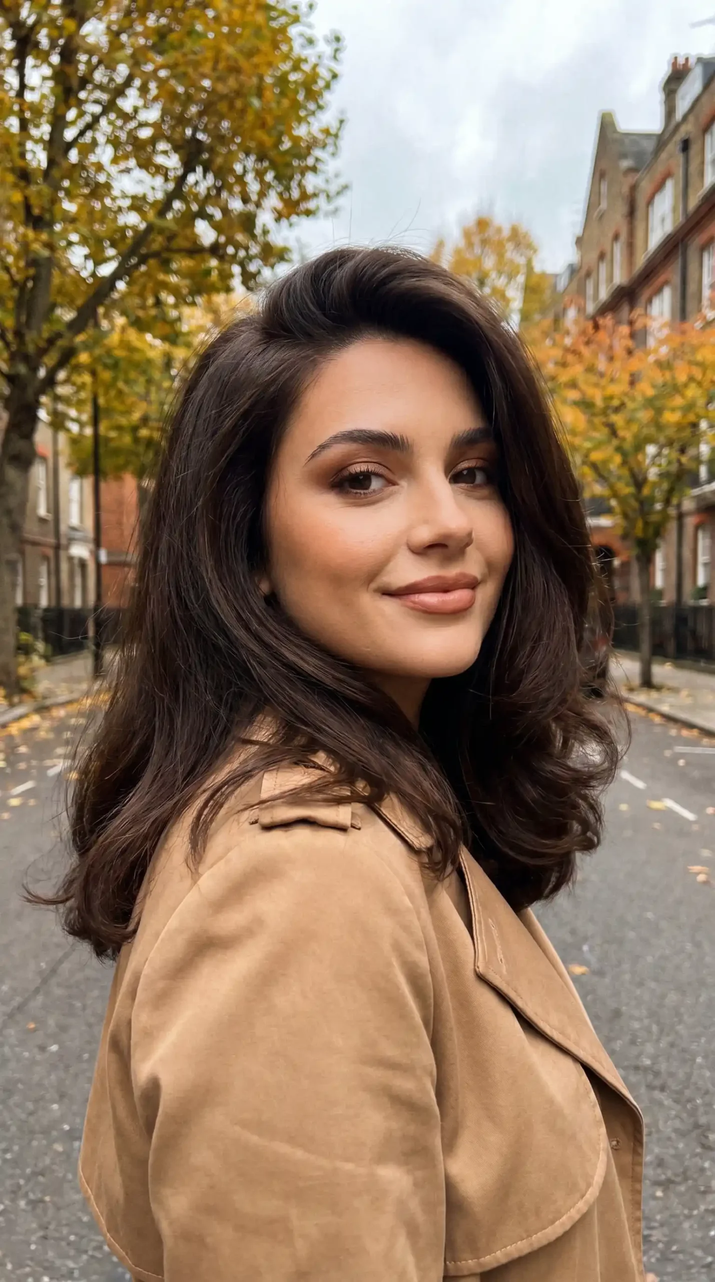 Woman with long dark chocolate espresso blowout hairstyle
