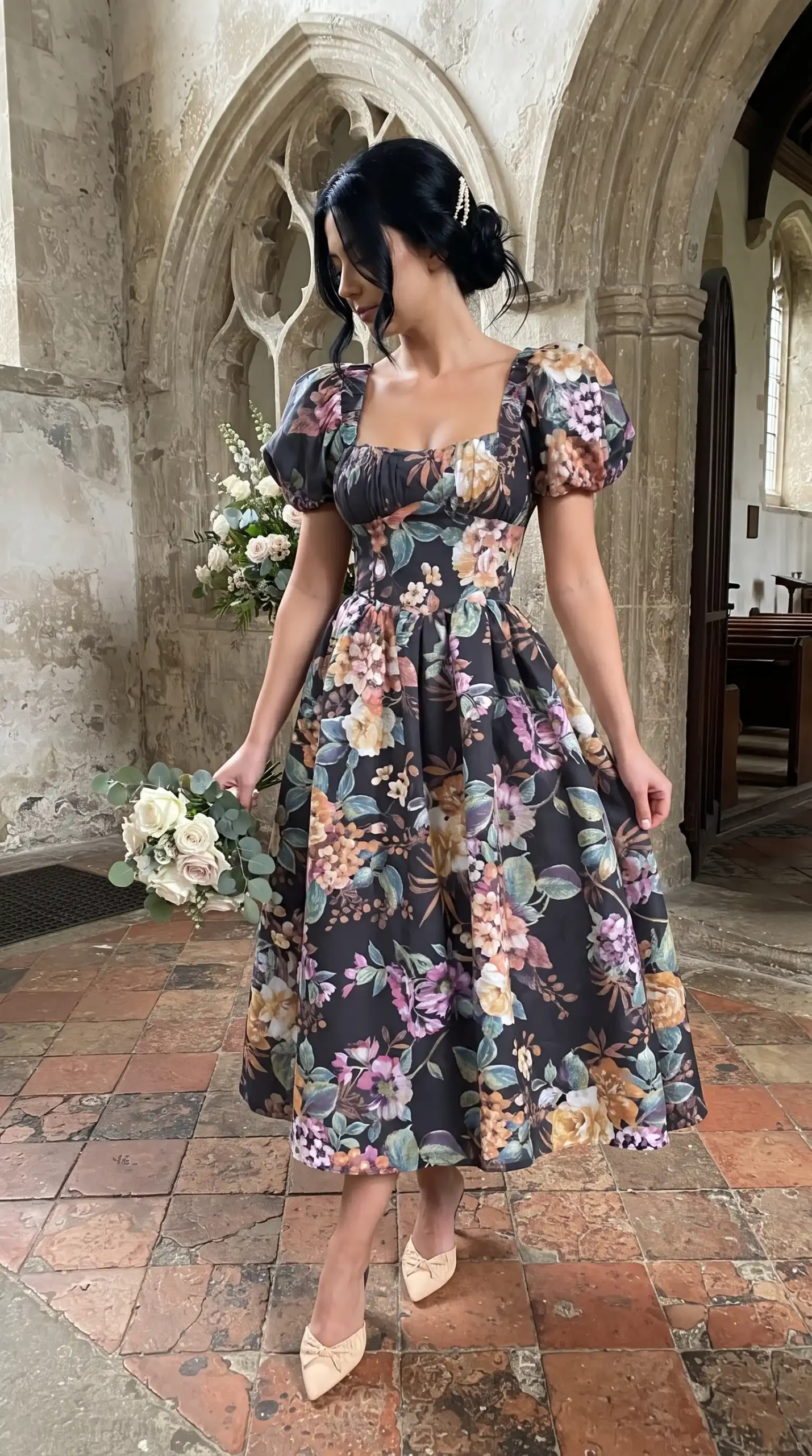 Woman wearing dark charcoal floral print sweetheart puff sleeve full skirt midi dress