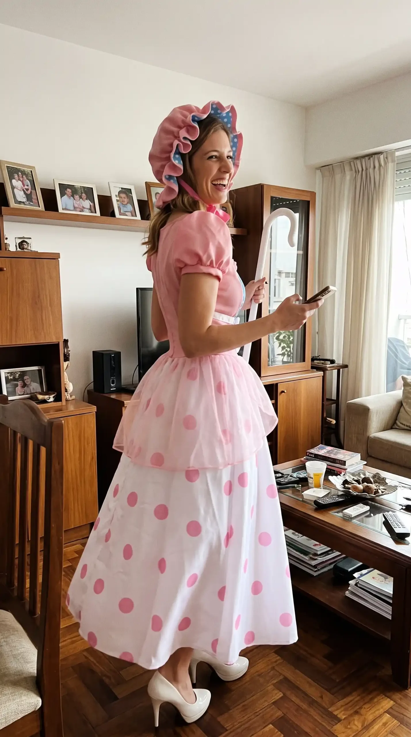 Woman dressed as Little Bo Peep from Toy Story in pink puff sleeve bodice