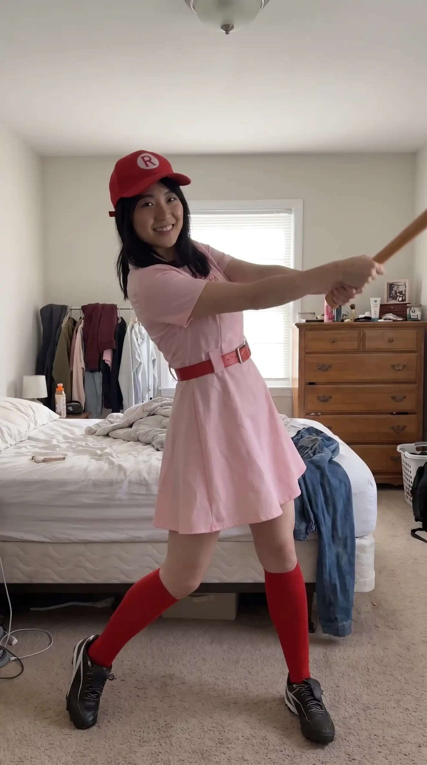Woman dressed as a Rockford Peaches player from A League of Their Own