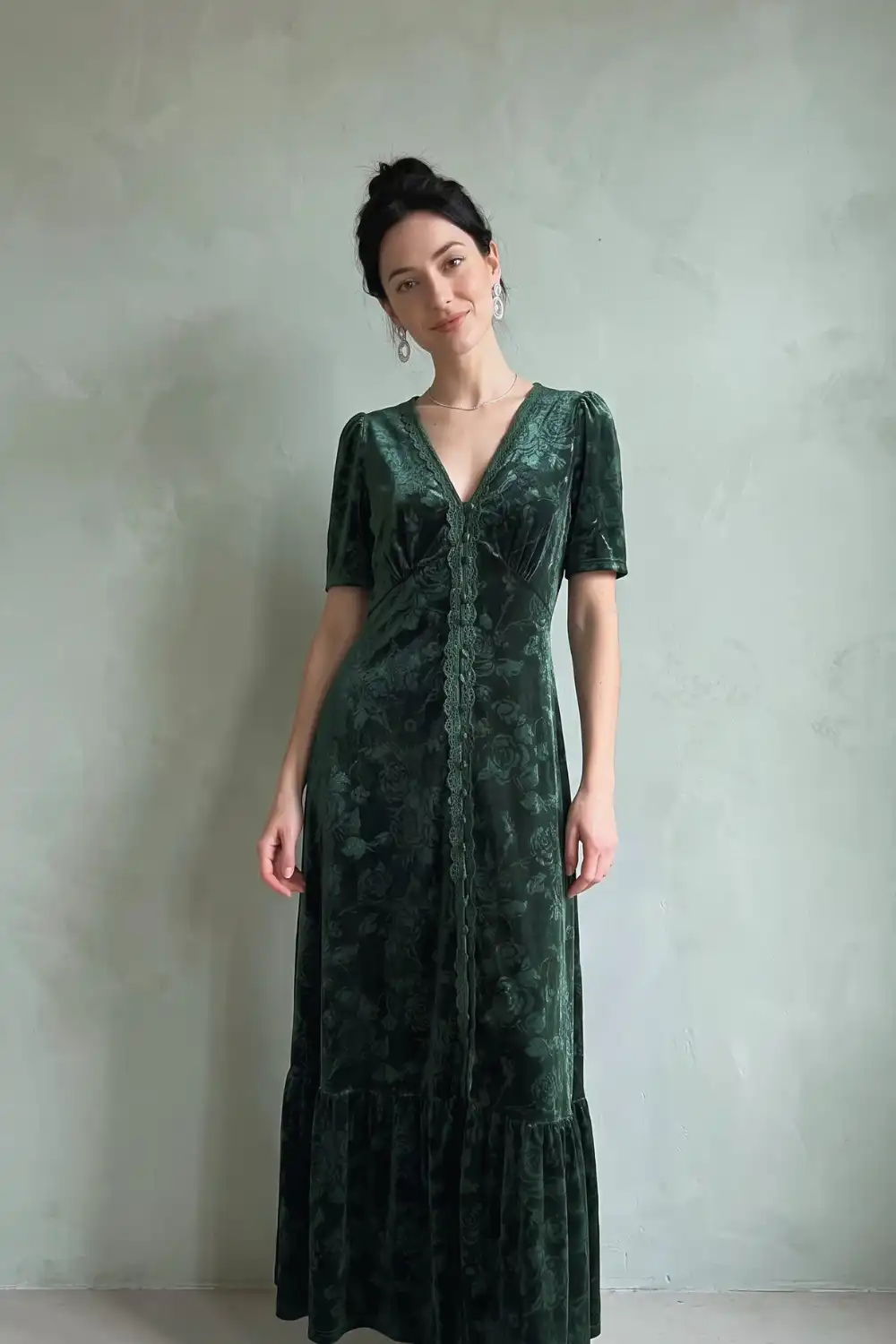 Woman in dark green floral burnout velvet lace trim short sleeve tiered maxi dress
