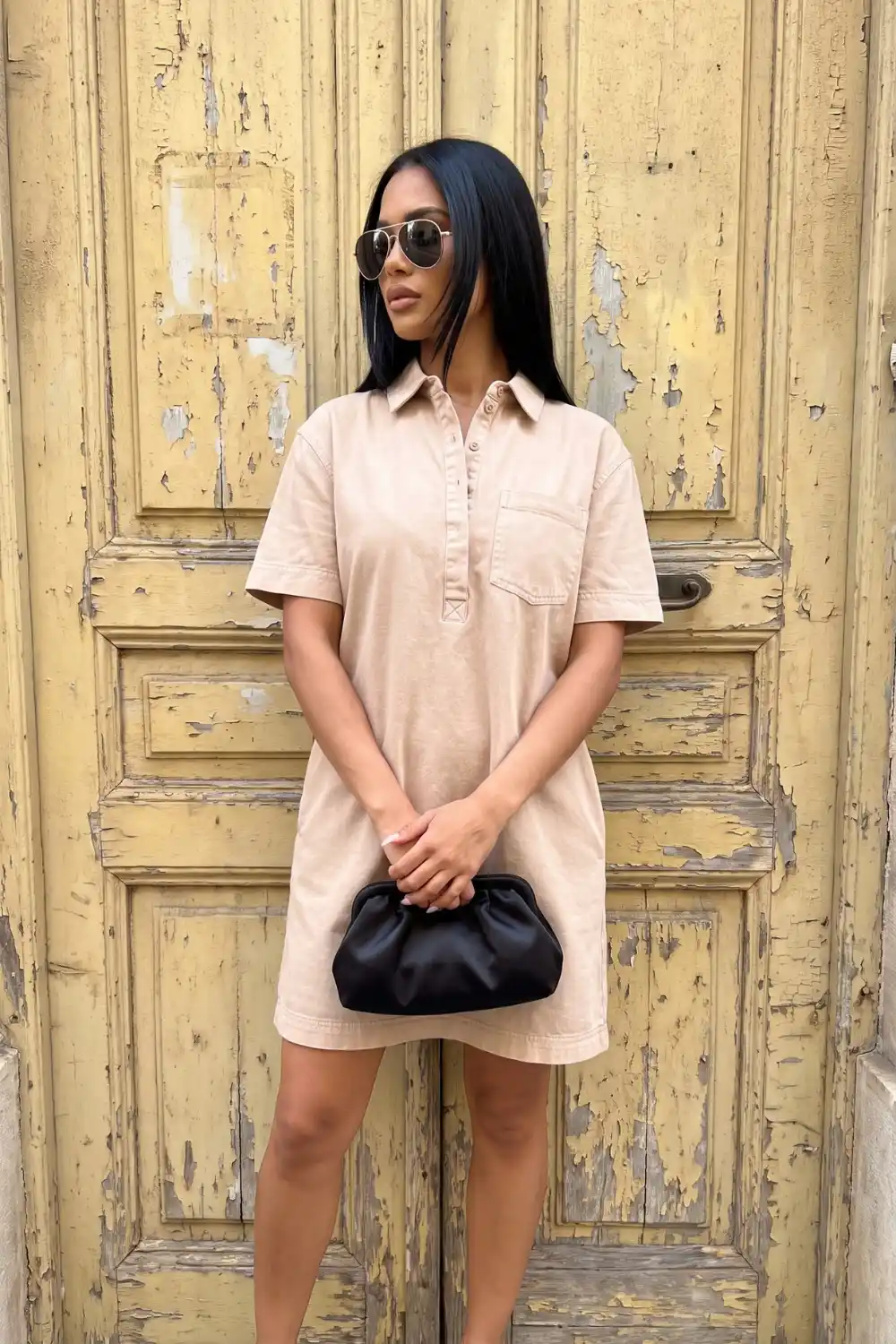 Woman wearing washed beige sand polo mini shirt dress