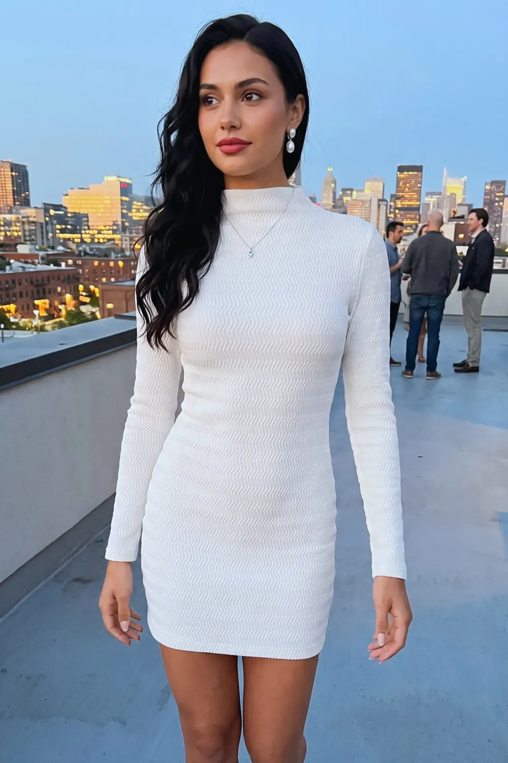 Woman in white textured mock neck bodycon mini dress